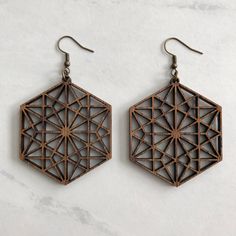 "These beautiful wooden earrings are inspired by the classic Japanese pattern called Asanoha. The ornate design resembles a plant and was often used on kimonos to represent good health. Made with 1/8\" red oak, light weight yet durable. Perfect for both formal and casual settings. We think you're really going to love these. ♥ Height - 2 \" Width  - 1.75\" Depth  - 1/8\" From piercing to  bottom of earring 2.75\"" Paper Quilling Earrings, Trendy Family, Wood Earring, Weaving Kit, Maple Plywood, Japanese Patterns, Free Earrings, Rag Quilt, Raw Wood