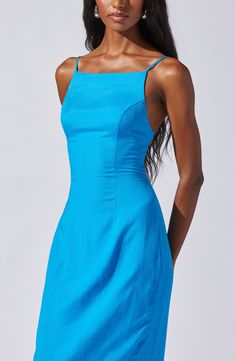 Blue Backless Dress With Adjustable Straps, Blue Fitted Dress With Adjustable Straps, Spring Fitted Dress With Strappy Back, Fitted Spring Dresses With Strappy Back, Spring Dresses With Fitted Shape And Strappy Back, Spring Dresses With Fitted Waist And Strappy Back, Fitted Lined Backless Spring Dress, Fitted Lined Backless Dress For Spring, Fitted Backless Spring Dress