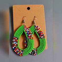 Handmade Beaded Earrings Green Multicolor Approx 2.5" New Traditional Green Teardrop Beaded Earrings, Green Teardrop Earrings With Tiny Beads, Green Teardrop Beaded Earrings With Tiny Beads, Green Teardrop Beaded Earrings For Gifts, Green Teardrop Beaded Earrings With Dangling Beads, Beach Style Green Beaded Earrings, Green Beaded Earrings With Large Beads For Gift, Green Beaded Chain Earrings, Bohemian Green Beaded Earrings With Colorful Beads