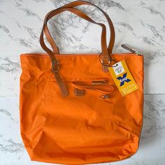 Brics Boutique London X Bag 3 In One Orange Nylon Tote Bag Nwt With Removable Crossbody Strap And Zip Pouch Exterior Zip Pocket Casual Waterproof Shopping Bags, Casual Waterproof Bags For Shopping, Orange Nylon Bags For Everyday Use, Casual Nylon Bags With Leather Handles, Orange Nylon Travel Bag, Nylon Tote Bags, Nylon Tote, Zip Pouch, 3 In One