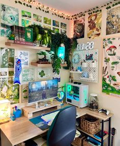 a home office with lots of plants and pictures on the wall