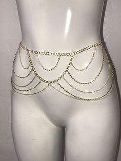 "please read description below NECKLACE/BODY CHAIN FEATURES: *waist measurement: fits up 40\" waist * clear crystals *Gold Tone *Quantity: 1 piece different length is available upon request :) JEWELRY CARE INSTRUCTIONS Fashion jewelry tarnishes when exposed to moisture, oils, salts and acids. - Thoroughly wipe each piece of jewelry with a soft, clean cloth as soon as you remove it. The goal is to remove any oil, salt or acid contaminants and to dry the piece. -Store your fashion jewelry in its c Adjustable Bohemian Waist Chain For Festivals, Bohemian Adjustable Waist Chain For Festivals, Adjustable Delicate Chain Body Jewelry For Festival, Adjustable Waist Chain For Festivals, Bohemian Gold Waist Chain For Beach, Gold Bohemian Body Chain For Festivals, Metal Waist Chain For Festivals, Bohemian Gold Body Chain For Festivals, Gold Adjustable Body Chain For Festivals