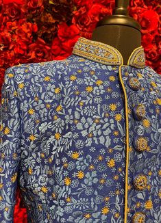 A regal blue sherwani adorned with intricate floral embroidery in gold and silver tones. The high-collared design and detailed buttons exude sophistication, making it perfect for weddings and grand celebrations. The luxurious fabric and rich embroidery make this sherwani a statement piece for any groom or special occasion. Key Features: Color: Royal blue with gold and silver floral embroidery. Design: High-collared with ornate buttons. Fabric: Rich, textured fabric for a luxurious feel. Occasion Royal Wedding Kurta With Zari Work, Royal Kurta For Eid Wedding, Royal Kurta For Wedding And Eid, Designer Blue Kurta With Intricate Embroidery, Royal Blue Traditional Wear For Formal Occasion, Royal Wedding Kurta For Eid, Royal Blue Traditional Wear For Formal Events, Designer Blue Formal Sets, Royal Festive Wedding Kurta