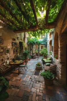 an outdoor patio with potted plants and tables