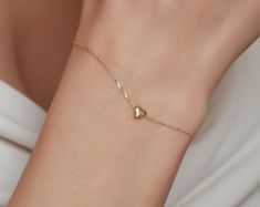 14K Solid Gold Dainty Heart Bracelet / Tiny Heart Bracelet / Jewelry Gift for Her - Etsy Vietnam Elegant Heart Beads Bracelet As A Gift, Elegant Bracelets With Heart Beads As Gift, Elegant Heart Beads Bracelets As Gift, Elegant Heart Beads Bracelet Gift, Elegant Bracelets With Heart Beads For Gifts, Minimalist Heart Bracelet For Anniversary, Dainty Everyday Bracelet With Heart Pendant, Dainty Heart Pendant Bracelet For Everyday, Minimalist 14k Gold Heart Bracelet For Valentine's Day