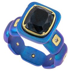 Deep Blue Tourmaline Titanium Ring by Vasilis Giampouras at Second Petale Gallery A unique celestial blue titanium ring. The center part of this masterpiece is the cushion-cut tourmaline, radiating a mesmerizing blue hue that captures the imagination. Its sculptural design not only enhances the gemstone's allure but also adds a sense of volume and dimension, evoking a sense of natural wonder. The diamonds on the shank, sparkle like the stars in the night sky. This ring is a wearable work of art Celestial Blue, Center Part, Titanium Ring, International Jewelry, Blue Tourmaline, Titanium Rings, Cocktail Ring, Blue Hues, Cushion Cut