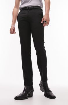 A lightly textured weave distinguishes neatly pressed trousers tailored in a skinny fit that looks smart whether casual or formal. 31" inseam; 14" leg opening; 10 1/2" front rise; 14" back rise (size 32) Zip fly with hook-and-bar closure 64% polyester, 34% viscose, 2% elastane Dry clean Imported Driving Shoes Men, Shoe Men, Textured Dress, Driving Shoes, Formal Style, Dress Pants, Shoes Mens, Black Jeans, Comfort Fit