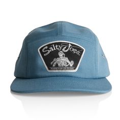 The Salty Joe's Back From The Depth Patch Five Panel Hat is our first five panel surf hat. Five panel hats are becoming very popular in surf culture so we decided to make our own. Our Back From The Depths patch is sewn into the 100% cotton five panel hat to ensure the highest possible durability. The blend of surf and fishing culture makes this surf hat a must-have. Get yours today with free shipping on orders $65+  100% Cotton  Five panel hat  Low profile Metal side eyelets Mid weight Buckle closure Beach Dad Hat With Flat Bill, Adjustable Blue 5-panel Bucket Hat, Cotton 5-panel Trucker Hat For Beach, Adjustable 5-panel Dad Hat For Beach, Adjustable 5-panel Snapback Hat For Skateboarding, Blue 5-panel Snapback Hat For Beach, Adjustable 5-panel Hat For Skateboarding, Adjustable 5-panel Skateboarding Hat, Surf Hat