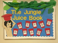 the jungle juice book is on display in front of a bulletin board