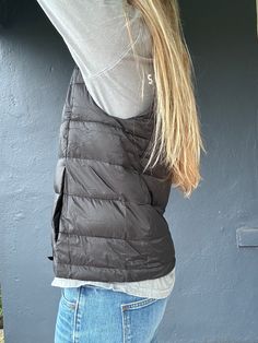 Stay toasty and on trend with the Beacon 2 Vest! This ultra-cozy puff vest has a high-neck design and a storage pouch for all your essentials. Keep warm and snug whether you’re out and about or just lounging around. Feeling fly has never been so easy! Casual Cold Weather Outerwear Vest, Black Puffer Vest For Outdoor, Casual Outdoor Vest Outerwear, Casual Nylon Vest For Fall, Casual Cold Weather Vest With Pockets, Casual Outdoor Vest For Fall, Casual Outdoor Fall Vest, Casual Fall Outdoor Vest, Casual Outdoor Vest