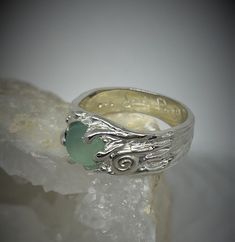 This ring comes out of the magic forest!  Its patterns and its stone give it a magical allure!  Sterling silver ring set with a stunning aqua chalcedony.  Original aquatic sculpture with a pretty spiral.  Inspired by stone, I sculpt the piece in wax and then cast it in sterling silver (lost wax technique.) Each ring is ergonomically made, comfortable. You will also appreciate the feel of a solid silver ring.  Calcedoine: 8 mm  If you want another size, stone, or another model, let me know and I Ocean-inspired Sterling Silver Rings, Ocean-inspired Sterling Silver Jewelry For Anniversary, Ocean-inspired Silver Jewelry For Wedding, Silver Ocean-inspired Jewelry For Promise Ring, Silver Ocean-inspired Promise Ring, Ocean-inspired Silver Gemstone Jewelry, Ocean-inspired Sterling Silver Jewelry For Weddings, Handmade Silver Rings With Ocean-inspired Style, Ocean-inspired Sterling Silver Jewelry For Wedding