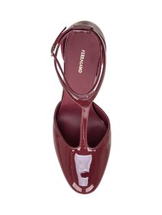 Shiny leather heels in burgundy. Closure with adjustable drawstring. FERRAGAMO logo on the sole. Stiletto heel.Composition: 100% Leather Burgundy Patent Leather Heels With Closed Toe, Burgundy Open Heel Evening Heels, Formal Burgundy Ankle Strap Sandals, Burgundy Almond Toe Heels With 4-inch Heel, Burgundy Open Heel Shoes With Strap, Burgundy Ankle Strap Heels For Formal Occasions, Formal Burgundy Ankle Strap Heels, Burgundy High Heels With Heel Strap, Formal Burgundy Heels With Leather Sole