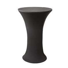 a black round table sitting on top of a white floor