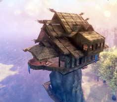 a small house on top of a cliff