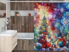 a bathroom with a shower curtain decorated like a christmas tree and presents on the floor