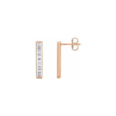 Classic and elegant, these baguette diamond earrings offer a sophisticated and sleek design. Metal: 14K gold Diamond Quality: H color, I1 clarity Diamond Weight: 0.50 carats total Earring Dimensions: 19mm x 3.5mm Ships in: 0-7 Days Rose Gold Baguette Cut Diamond Earrings, Modern Baguette Earrings For Formal Events, Modern Baguette Earrings For Formal Occasions, Minimalist Baguette Cut Formal Earrings, Minimalist Formal Baguette Cut Earrings, Rose Gold Baguette Diamond Earrings For Formal Events, Edelweiss Jewelry, Baguette Diamond Earrings, Titanium Wedding Band