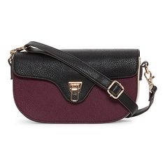 This Liz Claiborne women's Brielle flap shoulder bag is designed to be fashionable and functional, making it a must-have for your everyday collection. It's crafted from faux leather with gold-tone hardware and features interior pockets, a stylish flip-lock closure at the front, and an adjustable and removable crossbody strap. Closure Type: Flip LockPockets: 1 Front Zip Pocket, 1 Front Slip Pocket, 1 Back Slip PocketMetal Color: Gold ToneMeasurements: 9 Width/Inches, 5 Height/Inches, 2.5 Depth/In Trendy Flap Bag With Removable Pouch For Work, Daily Use Flap Baguette Bag With Detachable Strap, Travel Baguette Shoulder Bag With Magnetic Closure, Workwear Bags With Fold Over Clasp, Daily Use Crossbody Satchel With Magnetic Closure, Rectangular Work Bag With Fold Over Clasp, Trendy Travel Shoulder Bag With Magnetic Closure, Modern Red Flap Bag With Detachable Strap, Chic Shoulder Bag With Flap And Adjustable Strap