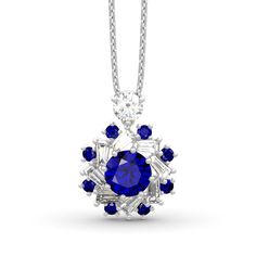 Exquisite and stunning, this necklace makes an adorable gift for loved one or yourself. Inspired from ballerina's flying skirt, it presents an elegant silhouette that will remain endlessly enchanting. Glistening double halo surrounds the sapphire blue center stone to create a sparkling and luxurious look. Crafted in sterling silver, it's durable and comfortable for daily wear. Add this masterpiece to your jewelrybox and you won't be disappointed.Carat Weight: 3.6 ctStone Size: 8 mmStone Type: Je Jeulia Jewelry, Pendant Ideas, Silver Jewelry Set, Antique Necklaces, Trending Jewelry, Sterling Silver Rings Set, Silver Ring Set, Vintage Necklaces, Silver Jewellery Sets