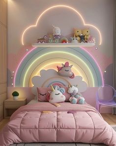 a child's bedroom decorated in pastel colors with unicorns on the bed