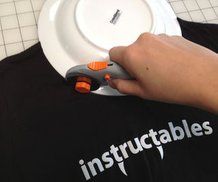 a person using a screwdriver on a t - shirt that says instructables