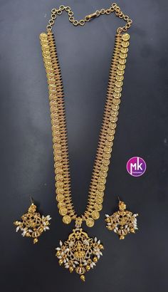 Lakshmi Kasu Premium Quality Matte gold finish long Haram with pendent and Earrings - Bridal Haram - Gold Jewelry Replica - MK Fashionkart Material: Premium Quality Matte gold finish AD stones, pearls Earrings: Matching Jhumka Suitable for Saree/Salwar/party wear dresses Adjustable length    SHIPPING : Ready to ship in 1 business day. This item will be shipped from The United States. Jewelry care instructions : 1. Please wipe the jewelry with a piece of cotton cloth after usage.  2. Store the je Long Haram, Gold Schmuck, Jewelry Care Instructions, Party Wear Dresses, Matte Gold, Bridal Earrings, Jewelry Care, Gold Finish, Chains Necklace