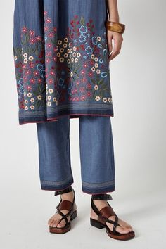 Blue kurta with floral embroidered motifs on hem, striped pattern and pleated bodice. Comes with pant. - Aza Fashions Traditional Spring Pants With Printed Motifs, Festive Blue Pants With Floral Embroidery, Festive Blue Pants With Chikankari Embroidery, Blue Straight Leg Pants With Floral Embroidery, Traditional Blue Embroidered Pants, Traditional Embroidered Blue Pants, Blue Floral Embroidered Wide Leg Bottoms, Spring Wide Leg Bottoms With Resham Embroidery, Straight Pants With Resham Embroidery For Spring