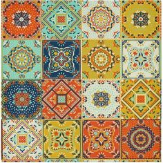 a multicolored area rug with many different designs on the front and back sides