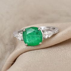 "Dive into the magical temptation of this stunning Ring in attractive shape and design made of White Gold studded with Zambian Emerald. An essential ornament to add in your jewellery collection! ✧✧Welcome To Our Shop Spectrum Jewels India✧✧ \"\"18k White Gold Wedding Ring Jewelry, Zambian Emerald Diamond Ring, Natural Brilliant Cut Zambian Emerald Statement Ring For Anniversary Gift\"\" ★PRODUCT SPECIFICATION★ * ITEM CODE - SER-21324A * METAL - 18k White Gold * 18k White Gold Weight : 2.58 gm  * Diamond White Emerald Ring With Round Cut, Silver Princess Cut Emerald Ring For Wedding, White Gold Emerald Princess Cut Wedding Ring, Dazzling Diamond Cut Emerald Ring For Wedding, Exquisite Emerald Ring With Diamond Cut, Dazzling Green Diamond Cut Ring, Dazzling Green Diamond-cut Rings, White Gold Diamond Ring With Emerald Accent Stones, Dazzling Round Emerald Ring With Diamond Cut