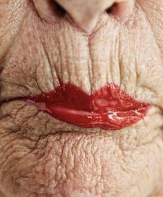 an old woman's lips with blood on them