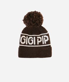 Gigi Pip beanies for women - Jane Retro Pom Beanie - retro inspired pom beanie featuring a limited edition Gigi Pip retro holiday logo [dark brown] Sporty Winter Beanie Hat, Winter Sports Beanie For Winter, Winter Sports Beanie One Size Fits Most, Winter Sports Beanie - One Size Fits Most, Winter Beanie, One Size Fits Most For Winter Sports, Sporty Winter Outdoor Hat, Sporty Winter Hats For Outdoor Activities, Sporty Winter Hats With Adjustable Fit, Sporty Adjustable Winter Hats