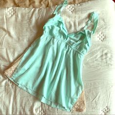 Sold Underella By Ella Moss Seafoam Satin Empire Camisole With Lace Insets. Really Pretty, Floaty Look For Lounge Or Regular Wear. No Tags But Never Worn Because It Doesn’t Fit My Bust (I’m 30d) Summer V-neck Sleepwear With Built-in Bra, Camisole With Built-in Bra For Loungewear, Spring Camisole With Built-in Bra For Relaxation, Summer V-neck Slip With Lace Trim, Cami Tank Top With Delicate Straps For Loungewear, Delicate Straps Tank Top For Loungewear, Tank Top With Delicate Straps For Loungewear, Loungewear Tank Top With Delicate Straps, Chic V-neck Sleep Camisole