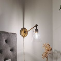 Timeless, versatile, and elegant, the Rosewood 1 light plug-in wall sconce in natural brass updates the traditional, instantly adding dimension and style to your space. A DIYer's dream, plug-in wall lights make installation as easy as hanging up a picture on the wall. You just need a few tools and an outlet; it's as simple as that. The option to plug in the light makes updating various locations in a home, condo, or apartment a breeze. Create that cozy reading nook you've been dreaming about or shine a light (or two) on your new home office, gym, or craft room. Equally functional and stylish, the arms on Rosewood sconce lighting move up and down while its shade swivels left, right, up, and down, allowing you to customize the angle and direction of light. Its clear shade adds an ambient glo Wall Mount Lights Bedroom, Picture On The Wall, Plug In Wall Lights, Reading Wall, Office Gym, Wall Sconces Bedroom, Sconces Bedroom, Cozy Reading Nook, Cozy Reading