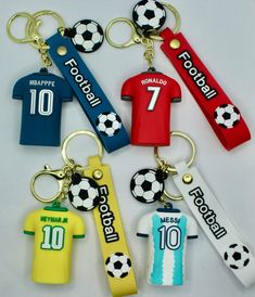 several key chains with soccer jerseys on them