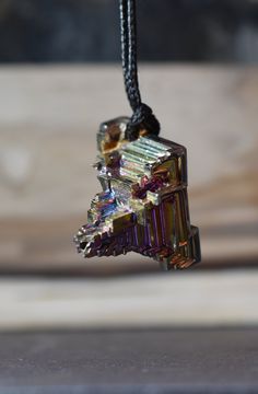 Bismuth Bead Pendant Gold Copper Rainbow Crystal Pendant Bismuth Necklace 78.49 carats 29 x 21 x 22 Bismuth is a crystalline, brittle metal that is silvery-white with an iridescent hue. As an elemental metal, its number is 83 on the Periodic Table. Bismuth is often lab-created. Rainbow colored Bismuth can be a wonderful stone to use for focus, visualization and shamanic journeying. It can prevent you from becoming overwhelmed by all of your responsibilities while at the same time increasing your Shamanic Journeying, The Periodic Table, Bead Pendant, Rainbow Crystal, Gold Copper, Pendant Gold, Beaded Pendant, Crystal Pendant, Gold Pendant