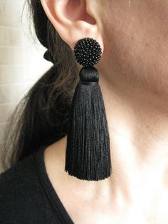 Beautiful bohemian black silk tassel earrings profitable accentuate any outfit. They will look amazing for everyday wear and also great for evening dresses. Ear part made of high quality Preciosa Czech seed beads. Simple in appearance but at the same time will look perfectly in the ears. Thanks to the stud and the wide earring back, the earring is securely held in the ear. They looks very elegant. Weight: 8 grams for one earring They are not heavy. Earrings will be packed in a gift box. More sil Diy Earrings Materials, Diy Fabric Jewellery, Fabric Jewellery, Rare Jewelry, Ear Parts, Heavy Earrings, Black Stud Earrings, Black Dress Formal, Black Stud