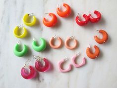 "Vintage 70s-80s women's small hoop earrings are made of light weight plastic with a nice chunky shape. Push back closure with clear rubber earring back. **Note: I do not know what kind of metal the stud posts are made of so if you have any sort of nickel/metal sensitivity please use caution** Hoops measure ~.5\"x1\"" Vintage Summer Hoop Earrings, Small Hoop Retro Earrings For Pierced Ears, Small Retro Hoop Earrings, 80s Jewelry, 80s Earrings, 80s Women, Earrings Aesthetic, Chunky Earrings, Plastic Earrings