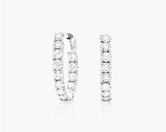 14K White Gold Inside Out Round Hoops, 1/2 Inch Diameter (0.50 ctw.). Make a grand entrance with these chic pair of diamond round hoops! Exquisitely crafted in 14k white gold with highly polished smooth finish. The hoops feature an inside out design prong set with round brilliant cut diamonds, nicely secured with comfortable hinged snapbacks. These gorgeous hoop earrings are a staple for every jewelry connoisseur! White Hoop Diamond Earrings With Single Cut, Classic White Hoop Earrings With Single Cut Diamonds, White Hoop Earrings With Single Cut Diamonds For Wedding, White Diamond Hoop Earrings For Wedding, White Single Cut Diamond Hoop Earrings For Wedding, Grand Entrance, Round Brilliant Cut Diamond, Round Brilliant, Prong Setting