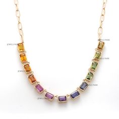 Rainbow sapphire emerald cut bezel set half link chain necklace gold | Natural multi sapphire octagon cut necklace gold | Sapphire Necklace  GEMSTONE DETAILS : ✦ Gemstone : Rainbow Sapphire ✦ Gemstone Type : Natural ✦ Gemstone Size : 6x4 MM ✦ Gemstone Shape : Emerald Cut \ Octagon Cut ✦ Gemstone Weight : 7-8 Carats ✦ Gemstone Grade : AAA METAL DETAILS : ✦ Metal : 14K/18K Gold ✦ Metal Color : Yellow / White / Rose Gold ✦ Setting : Bezel Setting ✦ Necklace Box : Yes SHIPPING DETAILS : ✦ Shipped vi Multi Sapphire Necklace, Gold Sapphire Necklace, Bezel Set Necklace, Chain Necklace Gold, Rainbow Sapphires, Multi Sapphire, Rainbow Bracelet, Link Chain Necklace, Necklace Box