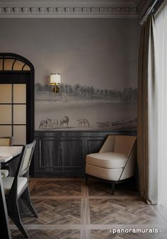 the dining room is decorated in black, white and gold colors with an elephant mural on the wall