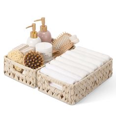 two wicker baskets with soaps, brush and lotion on white background for use in beauty products