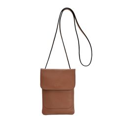 The Tan Crossbody Phone Bag is the perfect pick for staying organized on the go. Crafted from ethically sourced leather by our women-led partners in India, this bag is thoughtfully designed with a main compartment to hold your phone, wallet, and keys. Its detachable strap allows for versatile styling as a crossbody, shoulder bag, or clutch, enhanced with soft gold hardware. Compact yet roomy, this bag is built to last, reflecting our commitment to sustainable fashion and impactful craftsmanship. It's made to be valued and preserved, not just used and thrown away. Wipe with a clean dry cloth Leather Phone Bag, Sling Bags Women, Mini Sling Bag, Crossbody Leather Bag, Bag Stand, Accessories Bags Purses, Mini Crossbody Bag, Phone Wallet, Women Accessories Bags