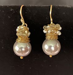 Pre 2000 Handmade Silvery Pearl W Wired Beads on 12 K Gold Wires, Dangle Earrings, Excellent VTG Condition, Size in Photos c. Pre 2000 Please read all descriptions and view all photos carefully. Please feel free to ask any questions that are not addressed on my policy page or in above description. I am happy to help. Thank you for wandering around my shop. I hope you enjoyed your visit and come back often, as I am continuously adding new items. Elegant Beaded Pearl Drop Earrings For Celebrations, Elegant Pearl Drop Beaded Earrings For Celebration, Elegant Beaded Pearl Earrings For Festive Occasions, Elegant Wire Wrapped Beaded Earrings For Party, Festive Beaded Dangle Pearl Earrings, Festive Gold Beaded Pearl Earrings, Party Gold Beaded Pearl Earrings, Handmade Dangle Pearl Earrings For Celebrations, Gold Beaded Pearl Earrings For Celebration