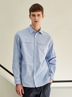 Editor's notesIt is a semi-oversized fit shirts with piped-trim detail and flap on the top of the front. The 100% cotton chambray oxford fabric gives soft and comfortable feel. The logo embroidery on the front makes the shirt more sophisticated.- Chambray oxford fabric- Piped-trim point- Flap on the front- Pocket on the front- Button closureMeasurements(in.)M / L / XL- Shoulder: 19.1 in. / 19.7 in. / 20.5 in.- Chest: 45.3 in. / 47.2 in. / 49.6 in.- Length: 30.1 in. / 30.7 in. / 31.5 in.- Sleeve Casual Cotton Shirt With Contrast Stitching, Casual Collared Tops With Contrast Stitching, Spring Cotton Shirt With Welt Pockets, Spring Cotton Shirt With Patch Pockets, Leather Label, Men Shirt, Oxford Fabric, Trim Detail, Logo Embroidery