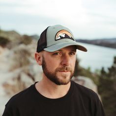 Discover Atomicchild's Mountain Range Classic Trucker Hat - a stylish snap back that fits most with a rugged PVC patch. Embrace nature's beauty with this durable and versatile accessory, perfect for outdoor adventures or everyday wear. Get yours now and experience the spirit of the mountains! Outdoor Snapback Hat With Curved Bill, Durable Casual Hat For Outdoor Work, Casual Durable Hats For Outdoor Work, Trucker Baseball Cap For Outdoor Activities, Casual Trucker Hat With Flat Brim For Adventure, Snapback Camping Hat, Casual Trucker Hat With Flat Bill For Adventure, Camping Snapback Hat, Casual Outdoor Trucker Hat