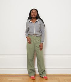 Classic relaxed pleat front pants with a wide leg and full length inseam. Zipper fly. 98% Cotton, 2% Linen. Machine washable. Hang Dry. Made in Los Angeles. Rise - 13" XXS - Waist= 26", Hips= 42", Inseam= 31" XS - Waist= 28", Hips= 44", Inseam= 31" S - Waist= 30", Hips= 46", Inseam= 31" M - Waist= 32", Hips= 48 ", Inseam= 31" L - Waist= 34", Hips= 50", Inseam= 31" XL - Waist= 36", Hips= 52", Inseam= 31" 1X - Waist= 38", Hips= 54", Inseam= 31.5" 2X - Waist= 40", Hips= 56", Inseam= 31.5" 3X - Wais Casual Wide-leg Pants With Zipper Closure, Casual High-waisted Pants With Zip Fly, Relaxed Fit Tapered Leg Pants With Zip Fly, Relaxed Fit Pants With Zip Fly And Tapered Leg, Cotton Wide Leg Cargo Pants With Zip Fly, Wide Leg Cotton Cargo Pants With Zip Fly, Casual Wide Leg Pants With Zip Fly, Spring Relaxed Fit Pants With Zip Fly, Relaxed Fit Pants With Zip Fly For Spring