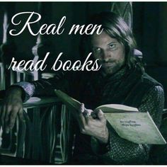 a man with long hair is holding a book