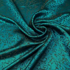 a blue and gold brocaded fabric