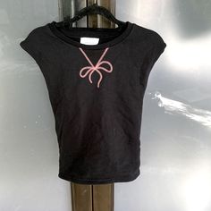 Never Worn, Excellent Condition. Sweatshirt Material, 100 % Cotton Spring Graphic Tee Sleeveless Top, Black Tank T-shirt For Spring, Y2k Sleeveless T-shirt For Spring, Fitted Sleeveless Graphic Tee, Casual Black Tank T-shirt, Black Sleeveless T-shirt For Spring, Black Sleeveless Graphic Tee, Sleeveless Sweatshirt, Marchesa