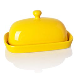 a yellow casserole dish is shown with different colors