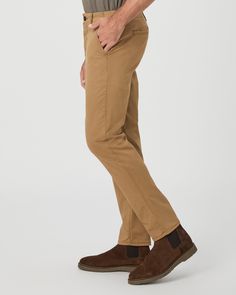 Danford is our modern chino style pant, fitted through the thigh and tapered from the knee to the leg opening. This cotton pant is blended with a slight stretch for maximum comfort without sacrificing a refined look. In a light brown hue, this easy pant will be your new everyday go-to. | Danford Chino Pant - Dried Tobacco | Size 36 Fitted Brown Chinos With Tapered Leg, Fitted Brown Tapered Leg Chinos, Brown Straight Chinos For Business Casual, Chino Cotton Twill Chinos For Work, Workwear Chinos In Chino Cotton Twill, Workwear Chinos With Standard Cut Leg, Standard Cut Leg Chinos For Workwear, Brown Tapered Leg Chinos For Business Casual, Brown Chinos For Business Casual